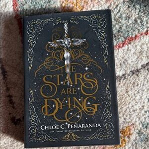 The Stars Are Dying Hardcover Book